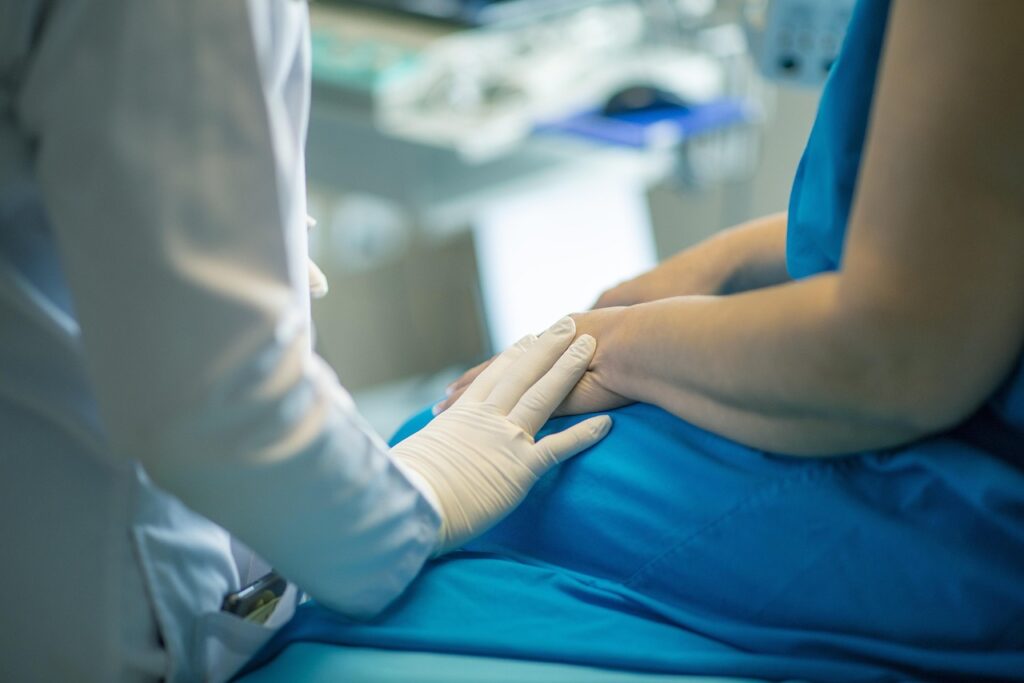 Doctor talking with a patient about coverage