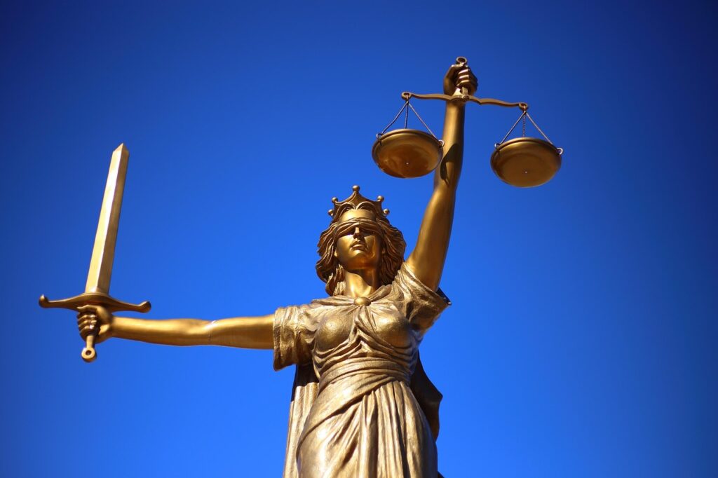Scales of justice representing equal coverage rules